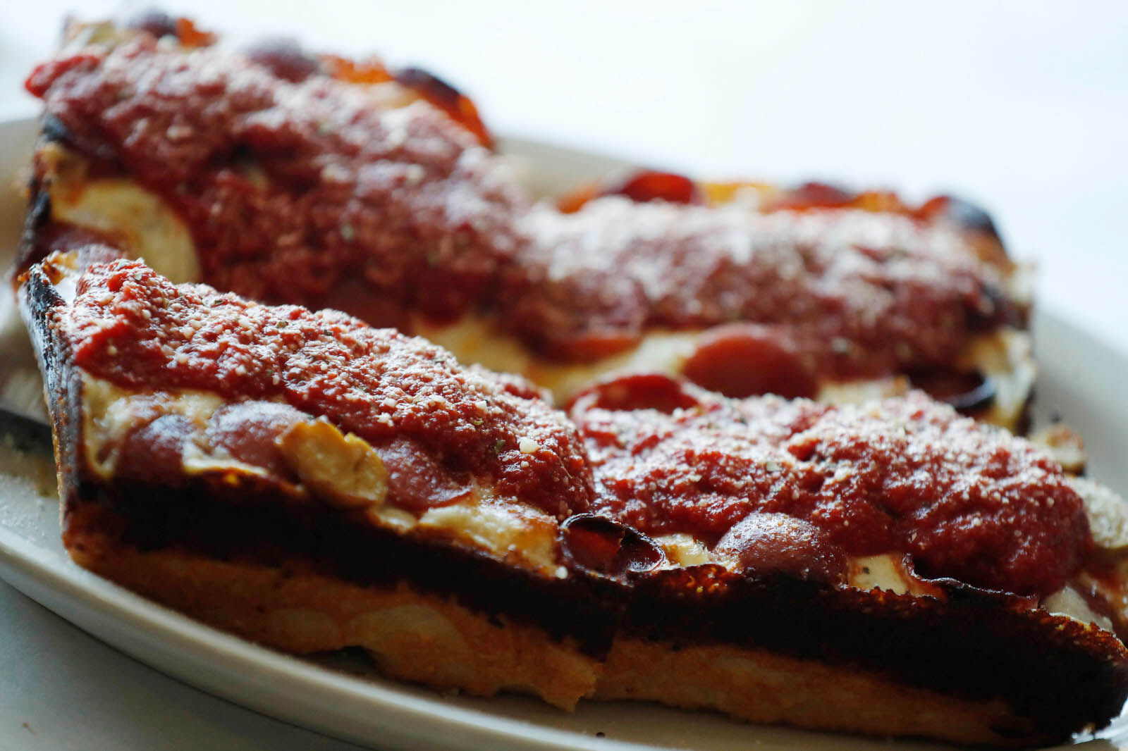 Detroit style dueling pepperoni pizza